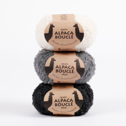 0100 - beveik balta DROPS Alpaca Bouclé